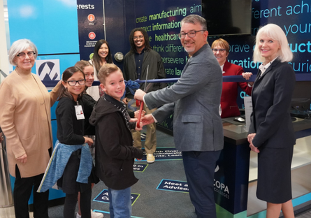 Governing Board President Marie Sullivan, Junior Achievement Students, Scottsdale Community College President Dr. Eric Leshinskie, Junior Achievement of Arizona President Katherine Kemmeries Cecala pictured with District Staff, Cam Huynh, Quincy Reams, and Julie Stiak