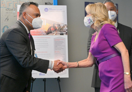 Dr. Steven R. Gonzales and First Lady Dr. Jill Biden shaking hands.