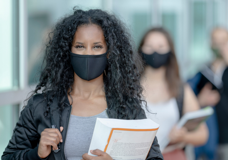 Image of students waring masks indoors