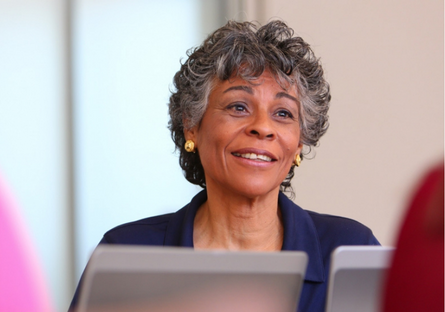 An image of a woman smiling