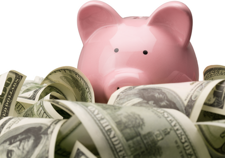 Image of a pink piggy bank with dollar bills