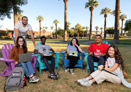 A group of Glendale Community College students sitting outside