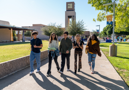 An image of a group of Mesa Community College students walking across the campus